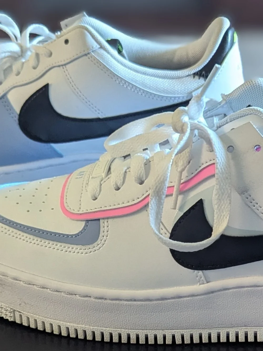 Nike women's White Sneakers with Black Swoosh and Pink Trim